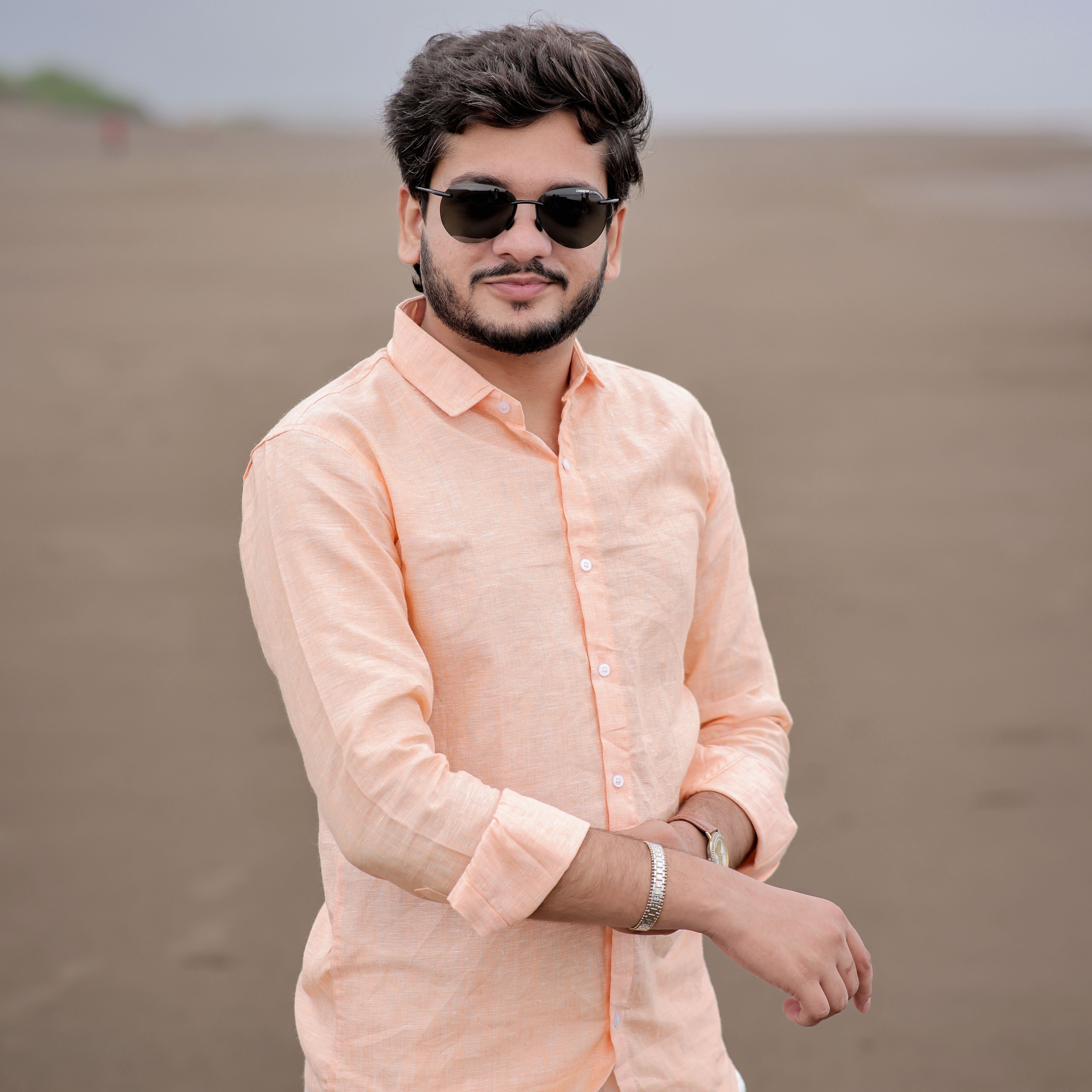 peach shirt in a desert